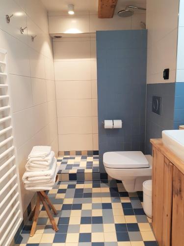 a bathroom with a toilet and a sink at 23 SouS in Amsterdam