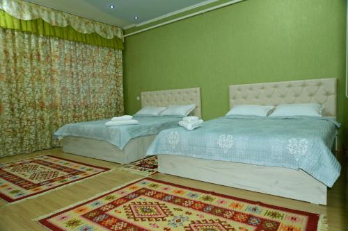 Postel nebo postele na pokoji v ubytování Astoria B&B