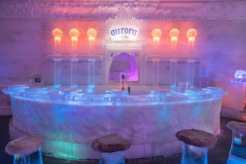 a ice room with a table and stools in it at Chena Hot Springs Resort in Chena Hot Springs