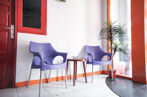 Χώρος καθιστικού στο RedDoorz near Palembang Square Mall 2