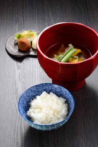 a bowl of rice and a bowl of soup at Akari no Yado Okabe in Shibukawa