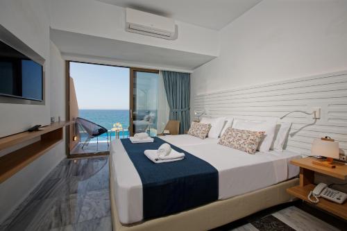 Posteľ alebo postele v izbe v ubytovaní Archipelagos Hotel