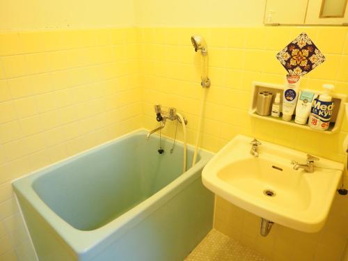 Ett badrum på Holiday Homes TSUBOYA 505