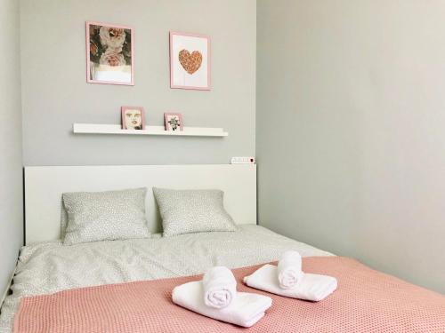 Posteľ alebo postele v izbe v ubytovaní Apartament Poznańska24