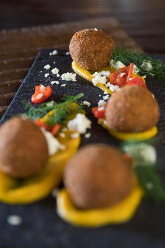 a plate of food with a bunch of food at Klaserie Drift Misava in Klaserie Private Nature Reserve
