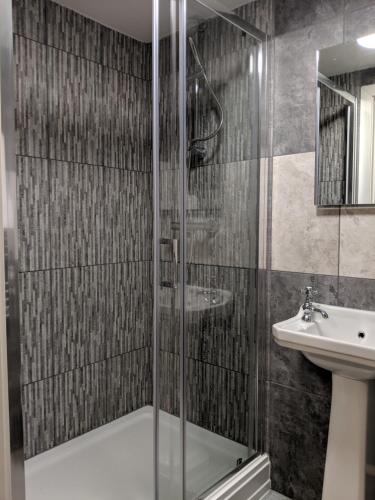 a bathroom with a shower and a sink at 80 Bedford Place in Southampton
