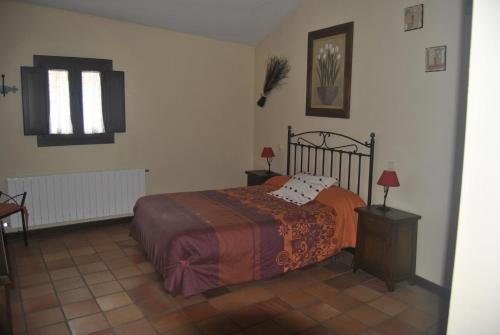 Ένα ή περισσότερα κρεβάτια σε δωμάτιο στο El Pozo