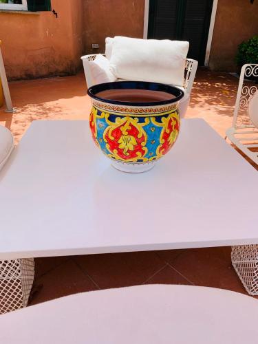 a bowl sitting on top of a table at Residenza Villa Spagnola in Parghelia