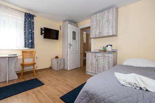 Postel nebo postele na pokoji v ubytování Villa Nautilus