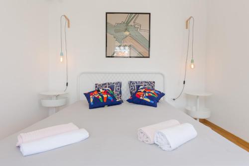 Postel nebo postele na pokoji v ubytování Casa Dubi Hvar
