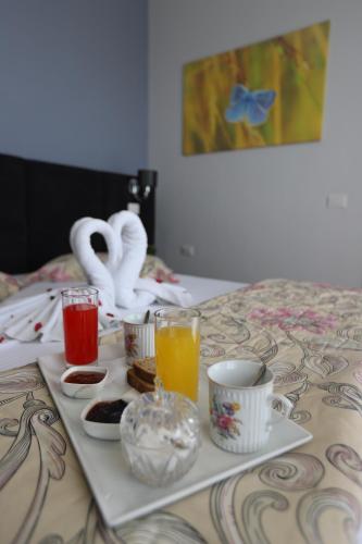 Un pat sau paturi într-o cameră la Perandor Beach