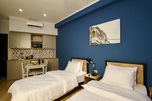 Ένα ή περισσότερα κρεβάτια σε δωμάτιο στο Apart-hotel TARHUN