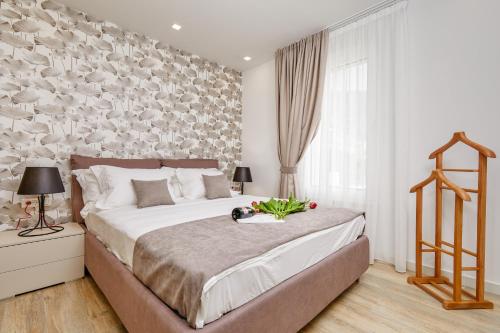 Postel nebo postele na pokoji v ubytování MAISON W