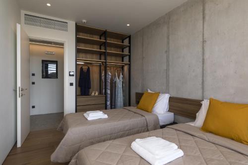 מיטה או מיטות בחדר ב-Momentum Villas