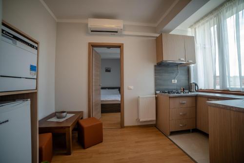 Kuchyň nebo kuchyňský kout v ubytování Elis Residence