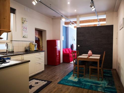 Kuchyň nebo kuchyňský kout v ubytování Millenium Inn Ferienwohnung Top 2