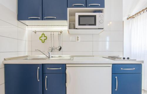 Køkken eller tekøkken på Apartments Bašković