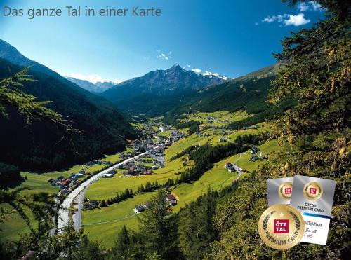 a view of a valley in the mountains at Haus Saskia in Sölden