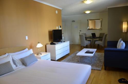 Katil atau katil-katil dalam bilik di Frisco Apartments