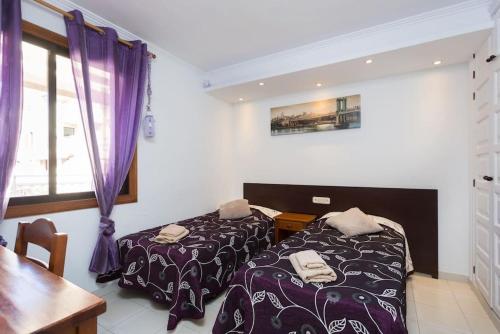 Кровать или кровати в номере Apartment Compostela