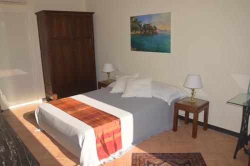 Letto o letti in una camera di Villa Albachiara