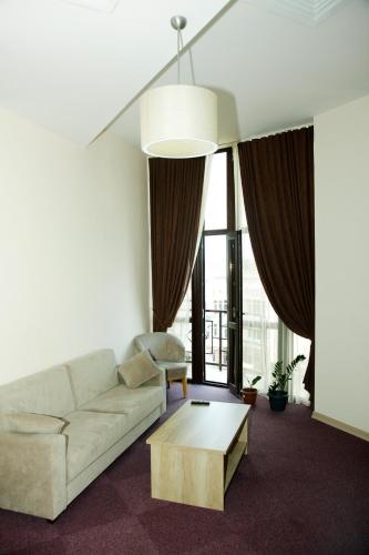 Zona de estar de Hotel Grand