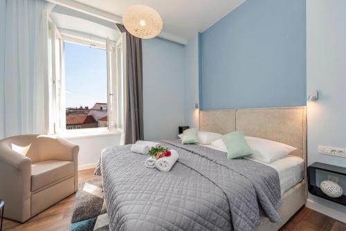 Postel nebo postele na pokoji v ubytování B&A Rooms Zadar