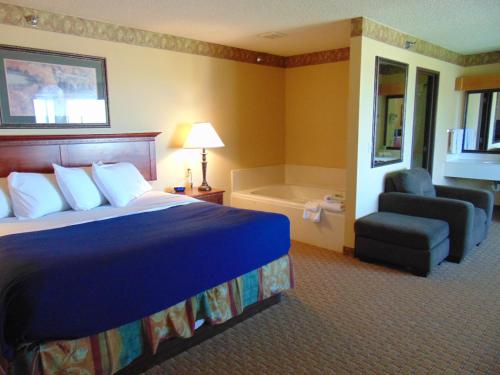 מיטה או מיטות בחדר ב-Horse Creek Inn