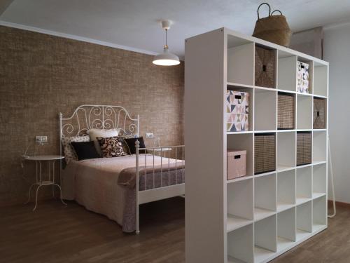 Tempat tidur dalam kamar di Encantador apartamento en el corazón de la Costa da Morte