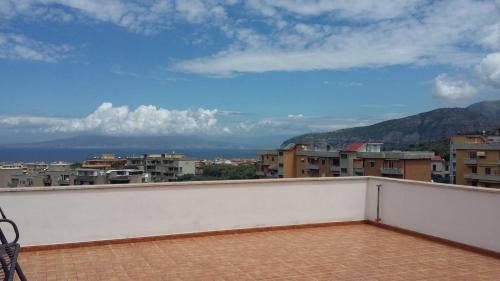 a balcony with a view of a city at Albatros Sorrento in Sorrento