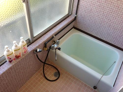 Phòng tắm tại Miyoshiya Ryokan