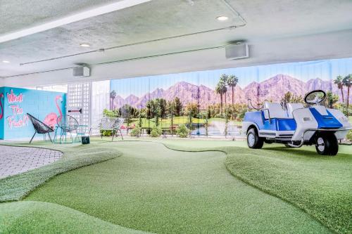 a golf course with a car on the grass at Downtowner Boutique Hotel in Las Vegas