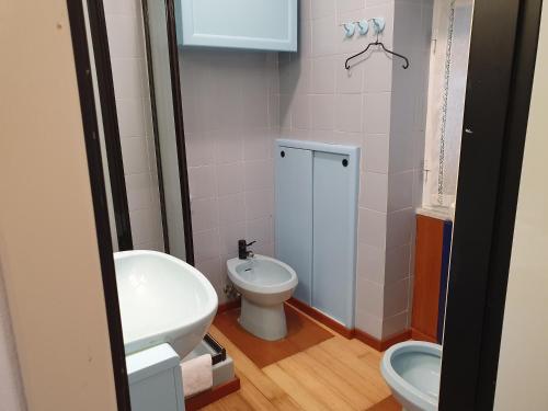 a small bathroom with a sink and a toilet at SESTRI Villa Vignolo with POOL in Sestri Levante