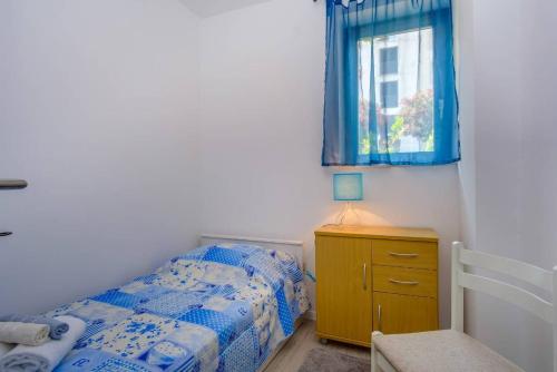 Postel nebo postele na pokoji v ubytování Maestral