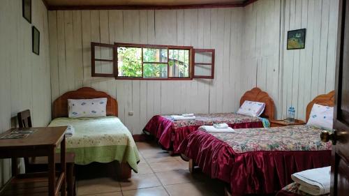 Posteľ alebo postele v izbe v ubytovaní Mandor Machu Picchu