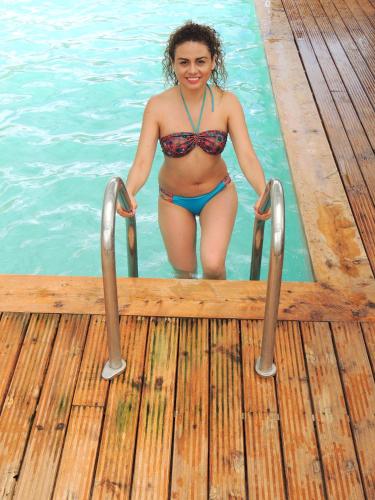 a woman in a bikini in a swimming pool at La Casta in Patate