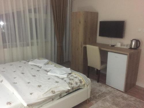 Ένα ή περισσότερα κρεβάτια σε δωμάτιο στο Apartment Perla