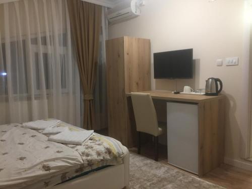 Ένα ή περισσότερα κρεβάτια σε δωμάτιο στο Apartment Perla