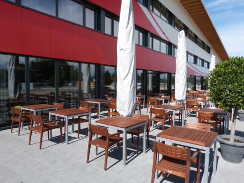 Ein Restaurant oder anderes Speiselokal in der Unterkunft Hotel Tissot Velodrome 