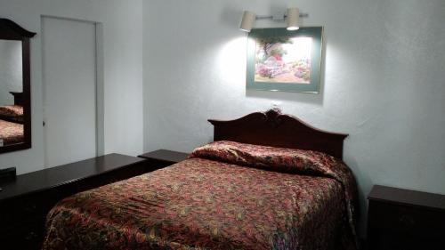 Katil atau katil-katil dalam bilik di El Rancho Motel