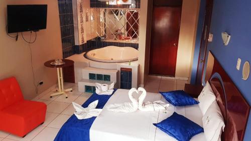 Cama o camas de una habitación en D'Richard Hotel