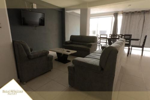 Zona de estar de Hotel Y Suites Axolotl