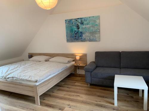 Ένα ή περισσότερα κρεβάτια σε δωμάτιο στο Ferienhaus Moritz