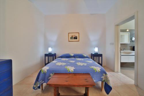 Postel nebo postele na pokoji v ubytování Island Break Residence