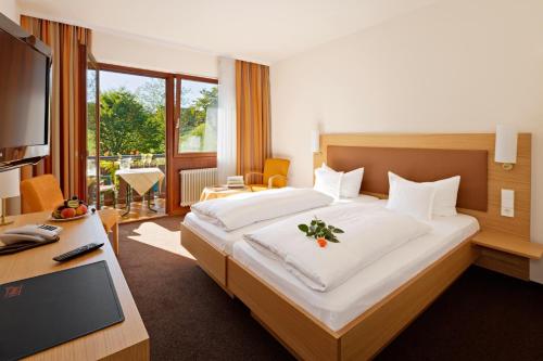 Voodi või voodid majutusasutuse Hotel 3 Könige toas