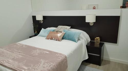 Ένα ή περισσότερα κρεβάτια σε δωμάτιο στο Apartamento Gaivota