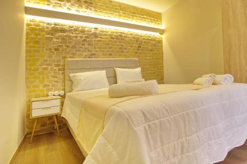 Letto o letti in una camera di Liston Inn Suites (Piazza) - Heart of Corfu Old Town