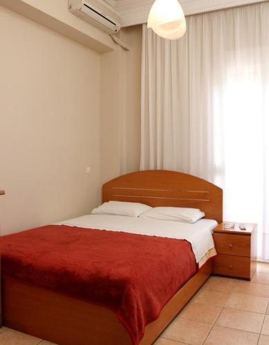 Ένα ή περισσότερα κρεβάτια σε δωμάτιο στο Noni Rooms