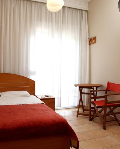 Ένα ή περισσότερα κρεβάτια σε δωμάτιο στο Noni Rooms