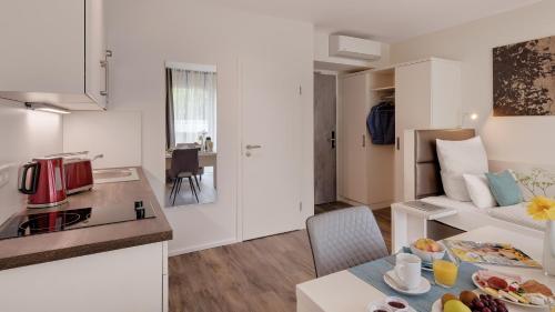 Amper Art Hotelにあるキッチンまたは簡易キッチン